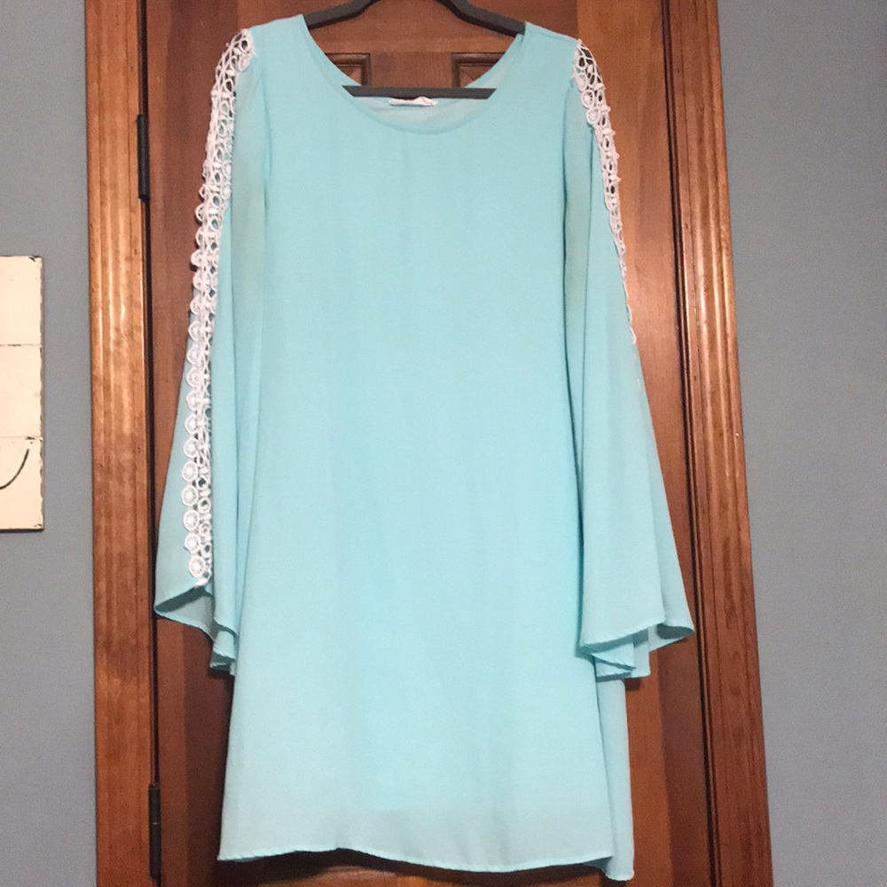Teal, knee length dress with bell sleeves